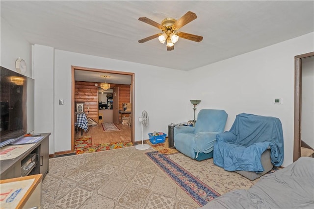 3 Maple St, Lyons, NY 14489 - living area featuring ceiling fan and baseboards