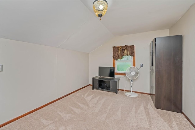 3 Maple St, Lyons, NY 14489 - additional living space with carpet floors, lofted ceiling, and baseboards