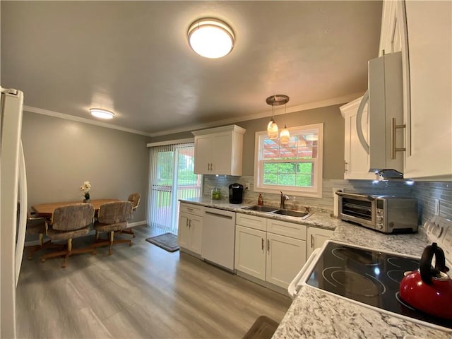 5 Melvins Ln, Big Flats, NY 14845 - kitchen with white appliances, a sink, tasteful backsplash, light wood-type flooring, and white cabinets