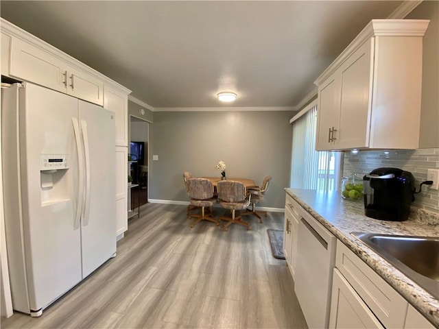 5 Melvins Ln, Big Flats, NY 14845 - kitchen with white fridge with ice dispenser, dishwashing machine, backsplash, baseboards, and white cabinets