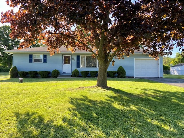 5 Melvins Ln, Big Flats, NY 14845 - view of front facade with a front lawn and driveway