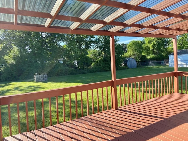 5 Melvins Ln, Big Flats, NY 14845 - wooden terrace with a lawn and view of scattered trees