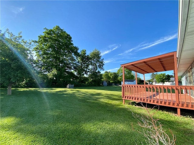 5 Melvins Ln, Big Flats, NY 14845 - view of grassy yard featuring a deck