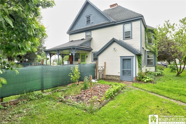 25 Academy St, Westfield, NY 14787 - rear view of house with a chimney