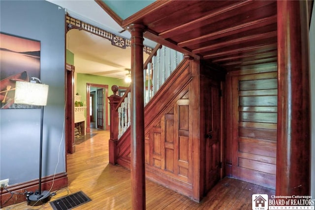 25 Academy St, Westfield, NY 14787 - hallway with hardwood / wood-style flooring and stairway