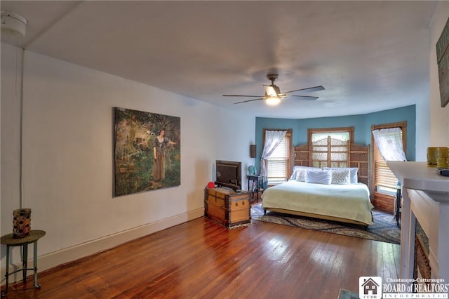 25 Academy St, Westfield, NY 14787 - bedroom with hardwood / wood-style flooring, baseboards, and ceiling fan