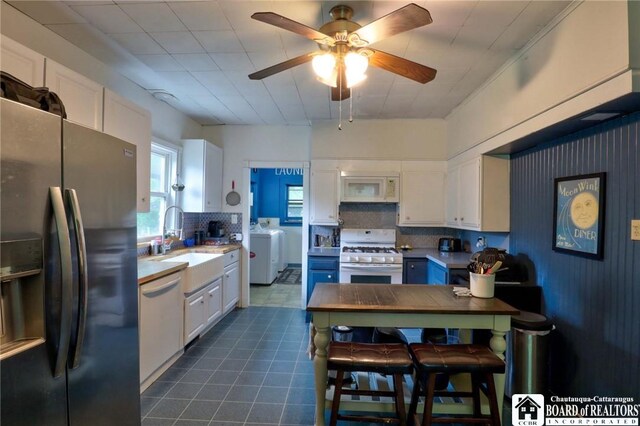 25 Academy St, Westfield, NY 14787 - kitchen with white appliances, a sink, white cabinetry, and a ceiling fan