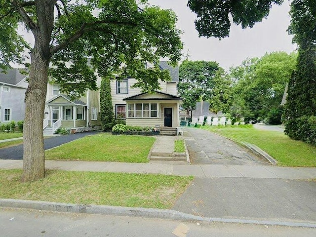149 Warwick Ave, Rochester, NY 14611 - view of front of house featuring a front lawn and asphalt driveway