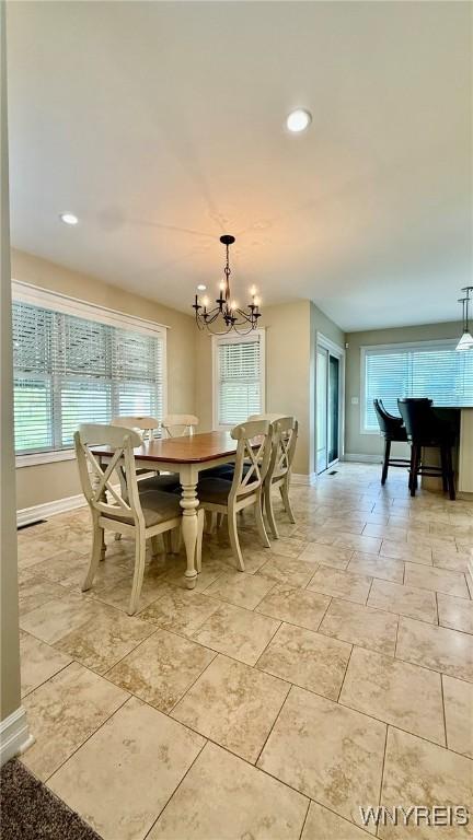 65 Islewoods, Grand Island, NY 14072 - dining room with a chandelier, baseboards, and recessed lighting