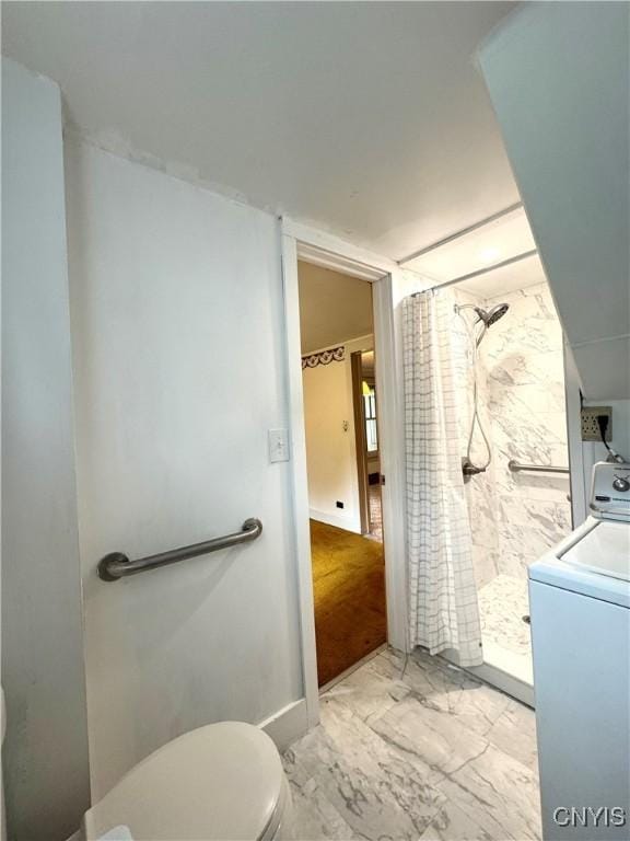 411 Hamilton St, Rome-Inside, NY 13440 - bathroom with washer / dryer, toilet, a stall shower, and marble look tile flooring