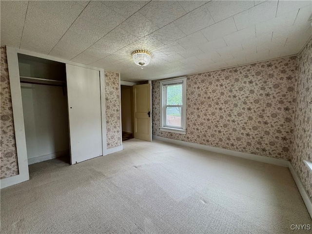 411 Hamilton St, Rome-Inside, NY 13440 - unfurnished bedroom with wallpapered walls, light colored carpet, a closet, and baseboards