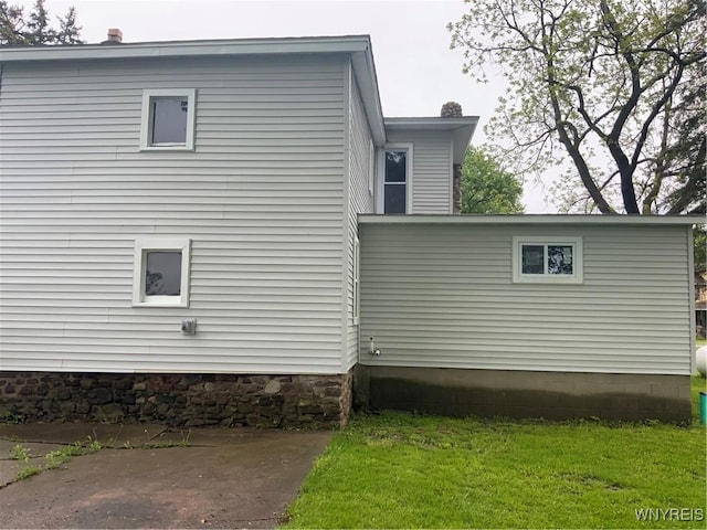 1750 Yates Carlton Townline Rd, Yates, NY 14098 - view of home's exterior featuring a chimney