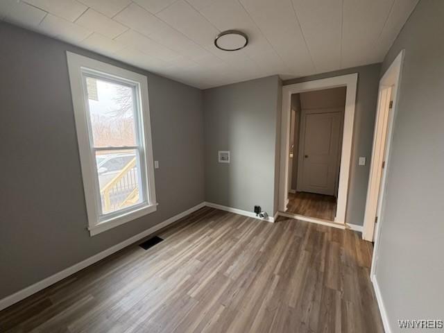 1750 Yates Carlton Townline Rd, Yates, NY 14098 - empty room with wood finished floors and baseboards
