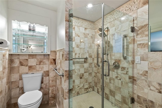 1 Creekside Ln, Pittsford, NY 14618 - bathroom featuring tile walls, toilet, a stall shower, and a wainscoted wall
