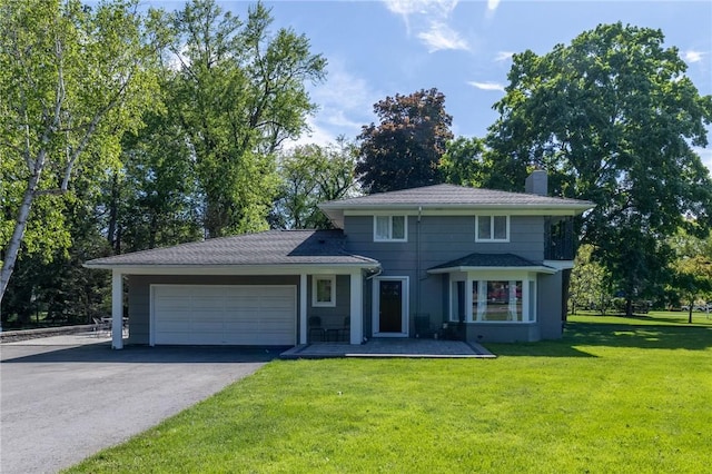 1 Creekside Ln, Pittsford, NY 14618 - view of front of property featuring a chimney, driveway, an attached garage, and a front lawn
