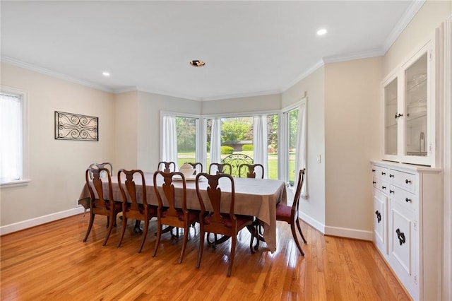 1 Creekside Ln, Pittsford, NY 14618 - dining area with light wood-style flooring, baseboards, recessed lighting, and ornamental molding