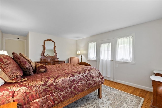 1 Creekside Ln, Pittsford, NY 14618 - bedroom featuring wood finished floors and baseboards