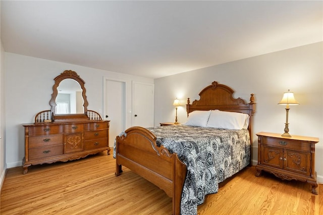 1 Creekside Ln, Pittsford, NY 14618 - bedroom featuring light wood-type flooring and baseboards