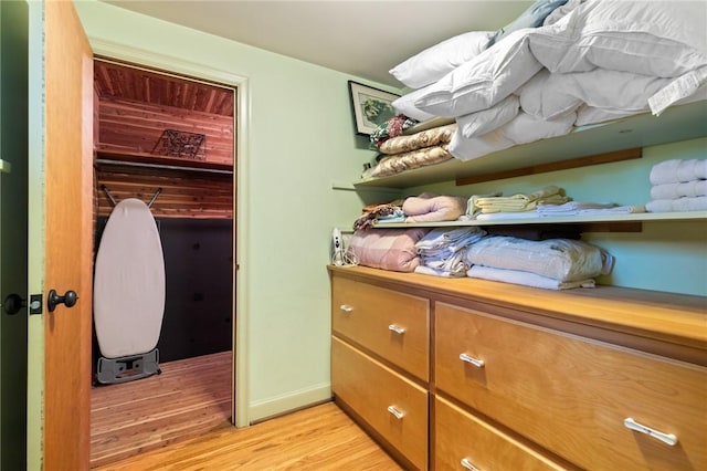 1 Creekside Ln, Pittsford, NY 14618 - walk in closet with light wood finished floors