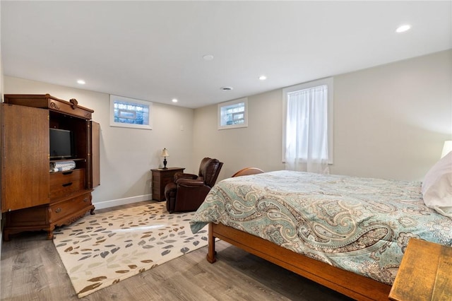 1 Creekside Ln, Pittsford, NY 14618 - bedroom with light wood-style floors, recessed lighting, and baseboards