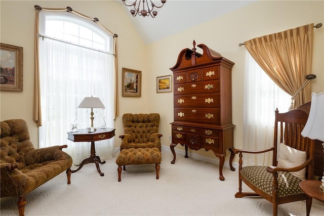 31 Hunters Run, Horseheads, NY 14845 - sitting room featuring lofted ceiling, a chandelier, and carpet floors