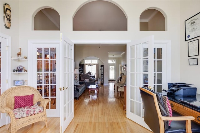 31 Hunters Run, Horseheads, NY 14845 - office space with french doors, wood-type flooring, and arched walkways