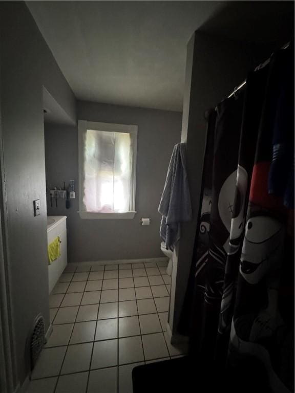 127 Maryland St, Rochester, NY 14613 - bathroom featuring a shower with curtain, vanity, toilet, and tile patterned floors