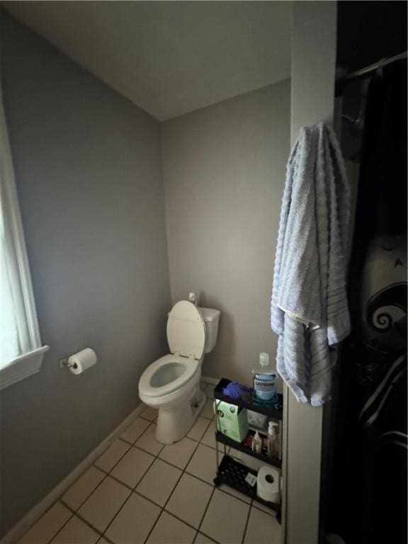127 Maryland St, Rochester, NY 14613 - bathroom with toilet, tile patterned floors, and baseboards