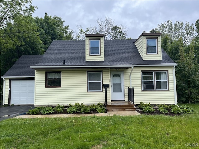 927 Jamesville Ave, Syracuse, NY 13210 - cape cod house featuring an attached garage, driveway, a front lawn, roof with shingles, and crawl space