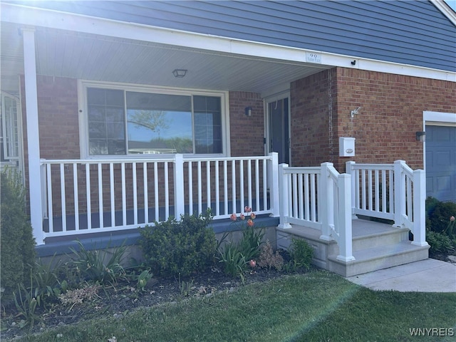 90 Nadon Pl, Tonawanda-Town, NY 14150 - property entrance with brick siding and a porch