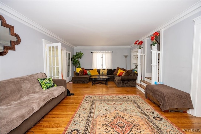 47 Winston Rd, Buffalo, NY 14216 - living room with light wood-type flooring, ornamental molding, and stairs
