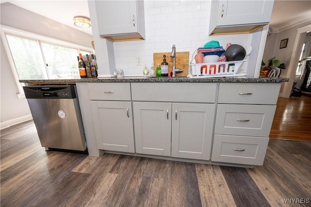 47 Winston Rd, Buffalo, NY 14216 - kitchen with stainless steel dishwasher, dark wood-type flooring, dark stone counters, decorative backsplash, and a sink