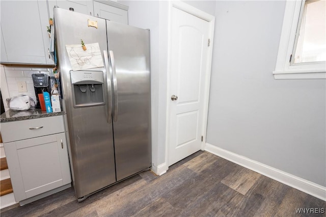 47 Winston Rd, Buffalo, NY 14216 - kitchen featuring stainless steel refrigerator with ice dispenser, dark wood finished floors, baseboards, tasteful backsplash, and dark stone counters
