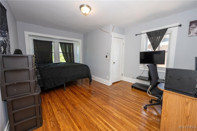 47 Winston Rd, Buffalo, NY 14216 - bedroom with wood finished floors, baseboards, and a desk