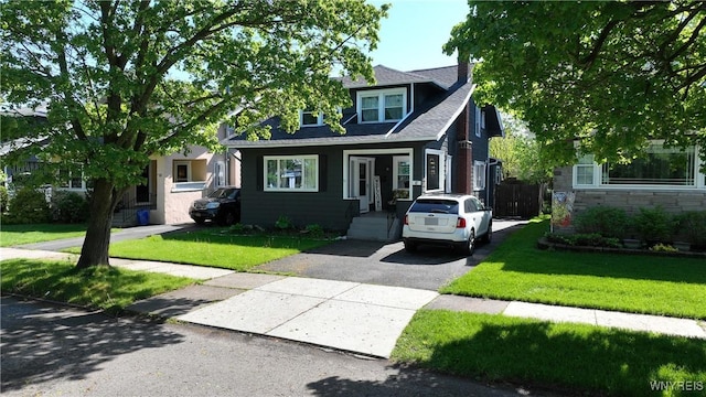 47 Winston Rd, Buffalo, NY 14216 - view of front of home featuring a front yard and asphalt driveway