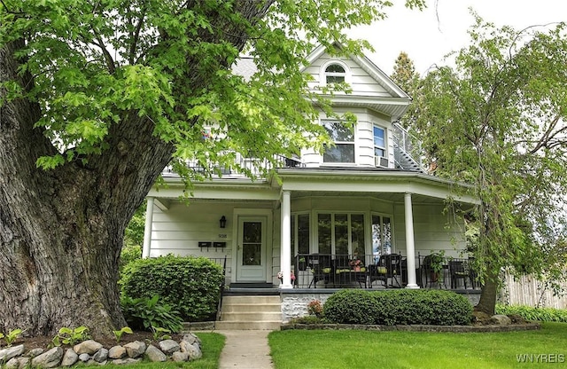 938 Ridge Rd, Lackawanna, NY 14218 - victorian home featuring covered porch and a front yard