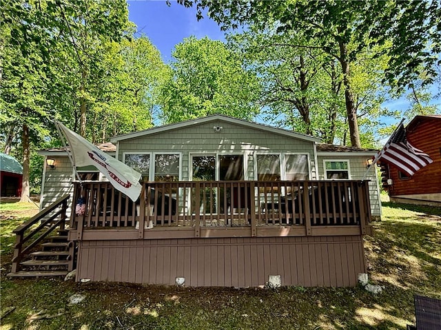 8119 Martin Rd, Wolcott, NY 14590 - back of property with a wooden deck