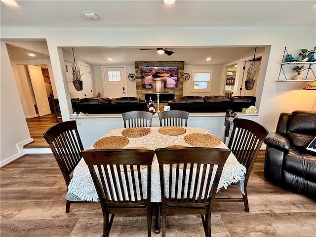 8119 Martin Rd, Wolcott, NY 14590 - dining room featuring plenty of natural light, wood finished floors, recessed lighting, a ceiling fan, and baseboards