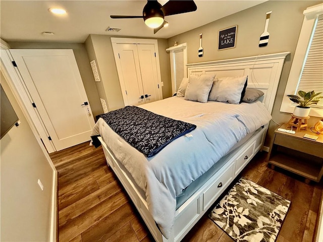8119 Martin Rd, Wolcott, NY 14590 - bedroom with dark wood-style floors, a closet, baseboards, ceiling fan, and recessed lighting