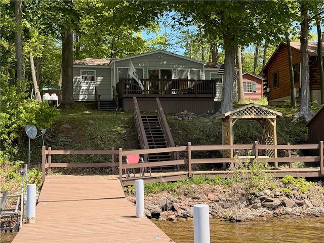 8119 Martin Rd, Wolcott, NY 14590 - dock featuring stairs, a gazebo, and a deck with water view