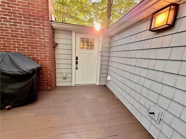 8119 Martin Rd, Wolcott, NY 14590 - property entrance with a deck