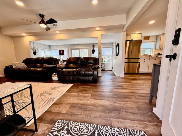 8119 Martin Rd, Wolcott, NY 14590 - living room featuring dark wood-style floors, a ceiling fan, and recessed lighting