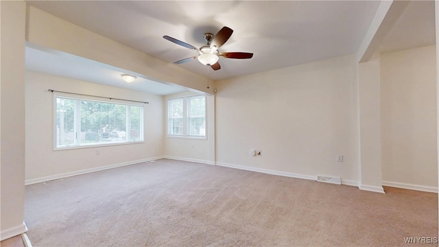 524 Lasalle Ave, Buffalo, NY 14215 - spare room featuring ceiling fan, light colored carpet, and baseboards