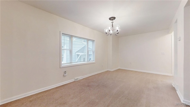 524 Lasalle Ave, Buffalo, NY 14215 - empty room with a chandelier, light carpet, and baseboards