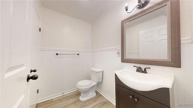 524 Lasalle Ave, Buffalo, NY 14215 - half bath featuring vanity, toilet, wood finished floors, and ornamental molding