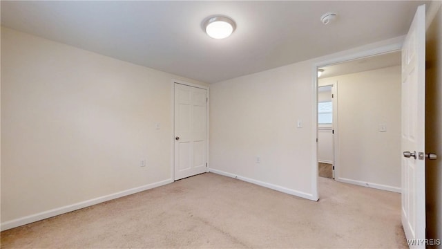 524 Lasalle Ave, Buffalo, NY 14215 - unfurnished room featuring light colored carpet, baseboards, and a smoke detector