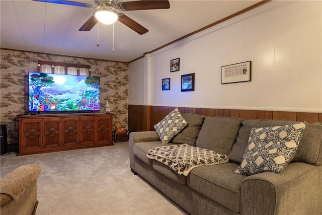 182 E Pulteney St, Corning City, NY 14830 - living area with wallpapered walls, carpet floors, ceiling fan, and a wainscoted wall
