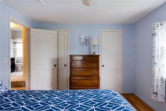 182 E Pulteney St, Corning City, NY 14830 - bedroom with wood finished floors and baseboards