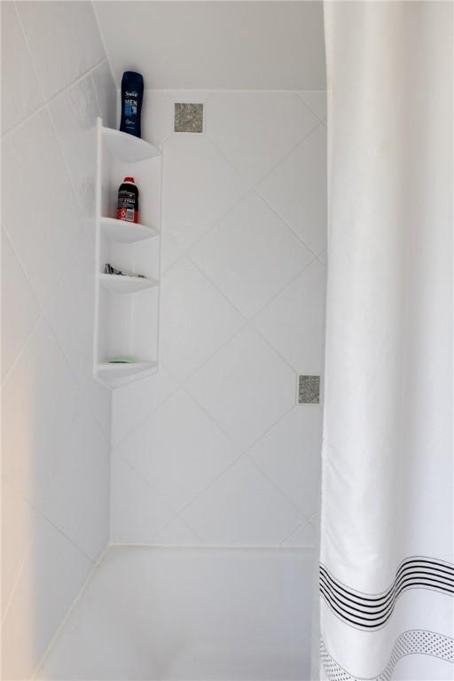 182 E Pulteney St, Corning City, NY 14830 - bathroom with a tile shower