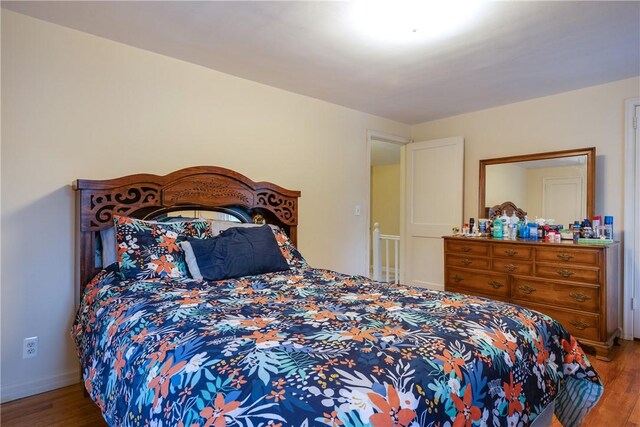 182 E Pulteney St, Corning City, NY 14830 - bedroom with wood finished floors and baseboards